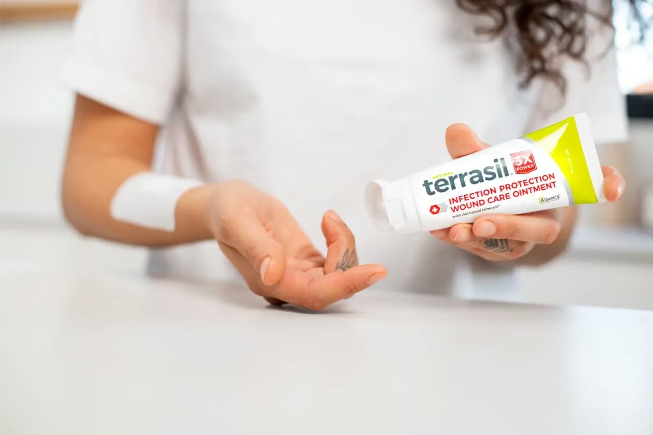 woman applying terrasil wound care ointment